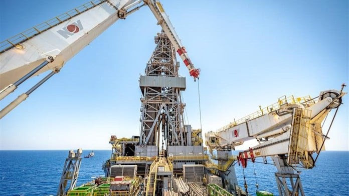 if you want your photo in a particular spot, most people just put the image name and caption in brackets. i.e. [BP Egypt image: BP has started production from the second development phase of the Raven field, offshore Egypt. (Source: BP)]