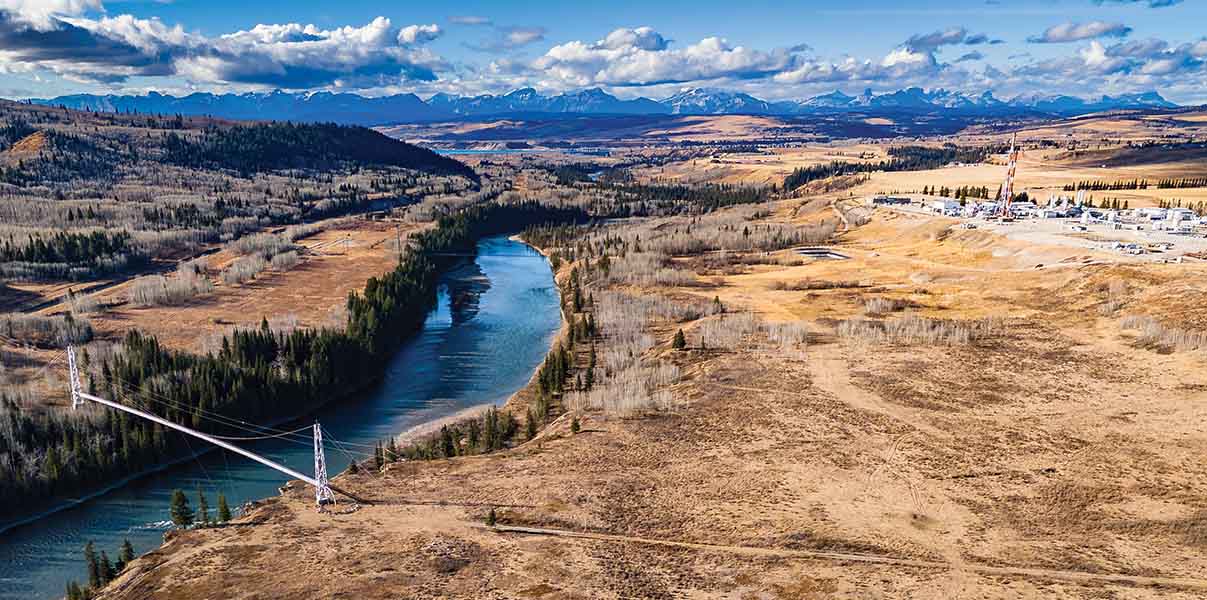 Natural gas pipeline crossing over a river near Cochrane Alberta