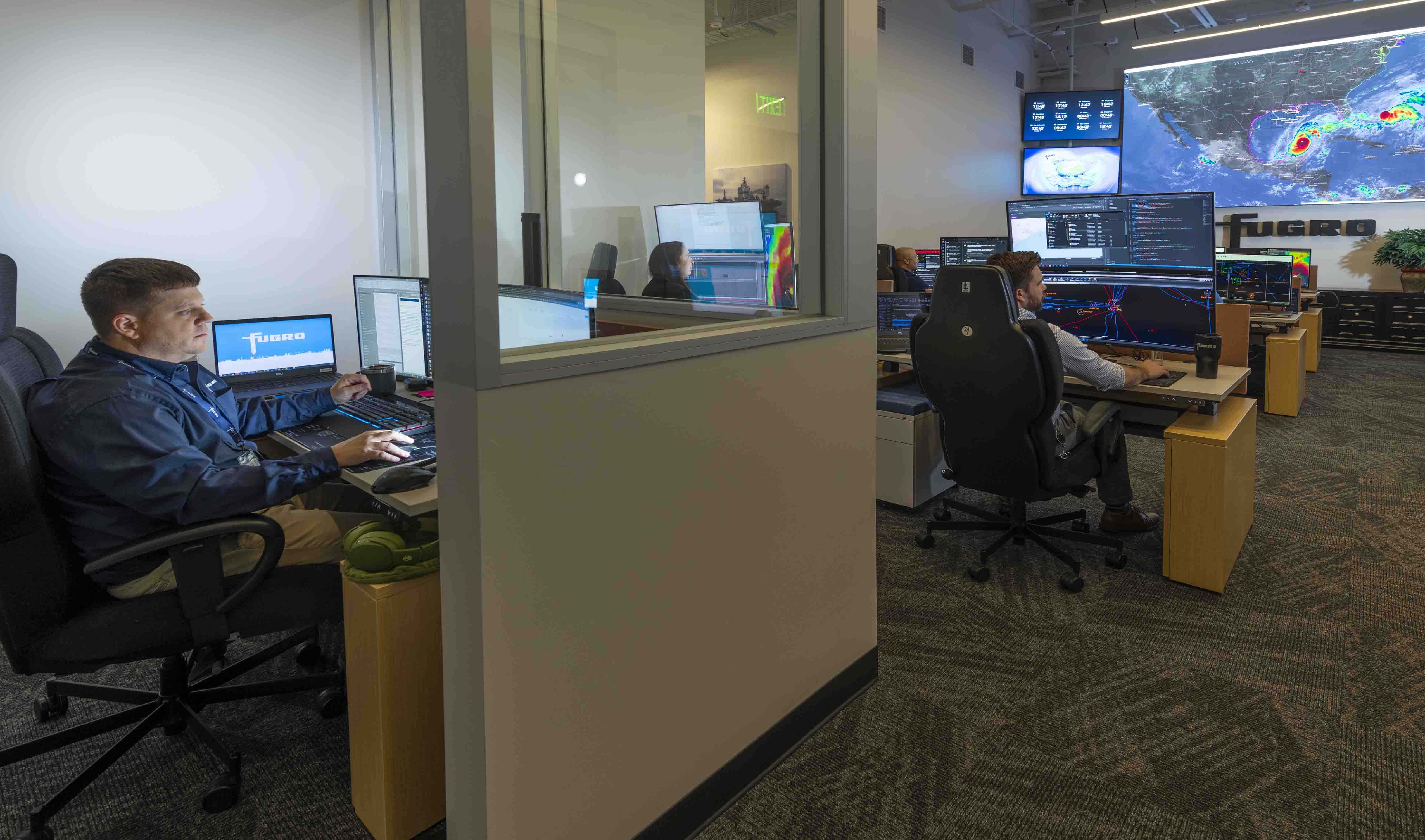 Workers at Fugro’s remote operations center keep an eye on hurricane activity in the Gulf of Mexico. (Source: Fugro)